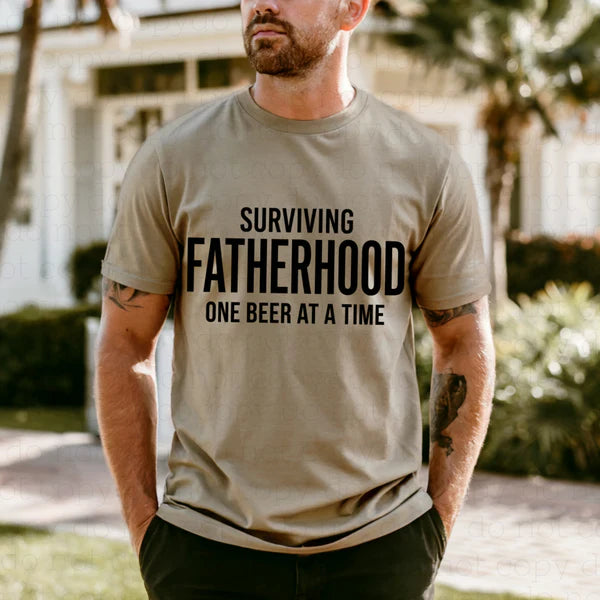 Surviving Fatherhood One Beer at a Time T-Shirt